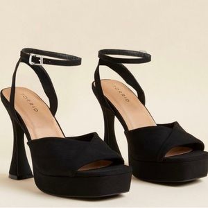 Torrid curved heel platform